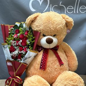 Oso mantequilla de 1 metro con ramillete de 12rosas